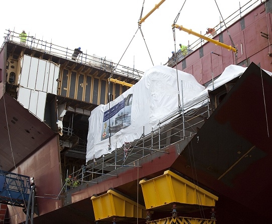 The MT30 is lowered onto HMS Queen Elizabeth.