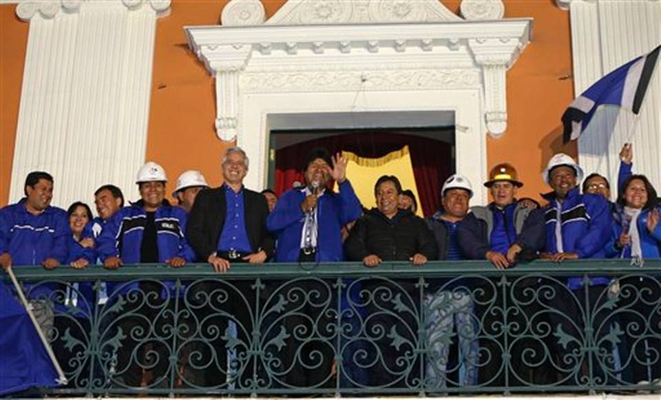 Evo Morales speaks from the balcony of the presidential palace in La Paz, Bolivia.