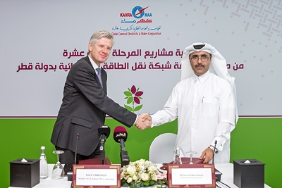 Siemens' Ralf Christian and Essa bin Hilal Al-Kuwari, President of KAHRAMAA, during the signing ceremony.