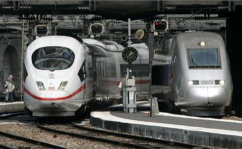 German ICE and a French TGV train arriving together in Paris