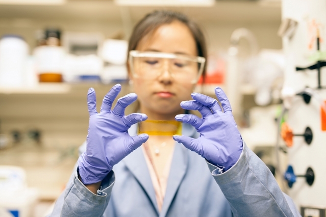 MIT postdoc, Grace Han, handles a PCM composite