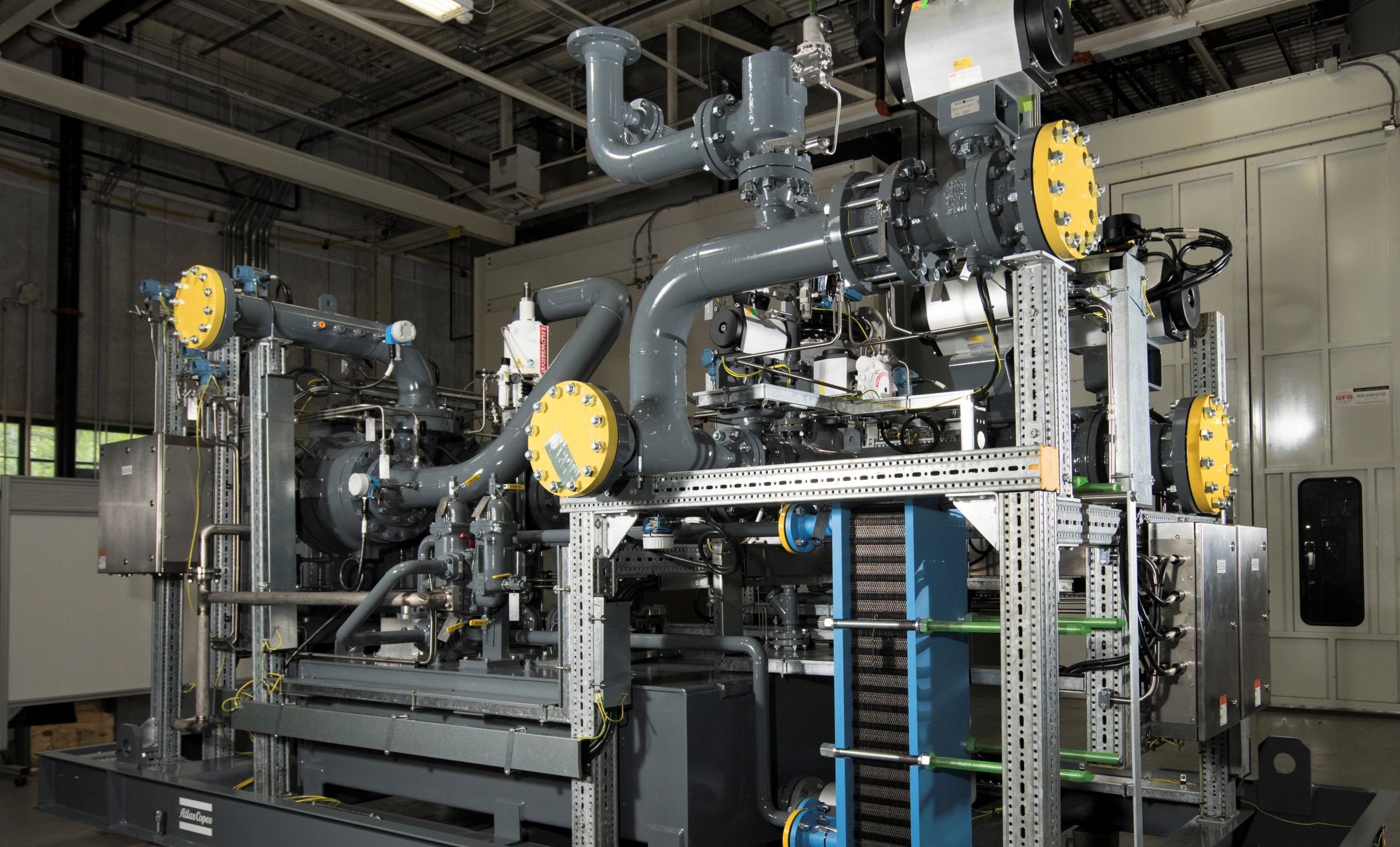 Centrifugal fuel gas booster